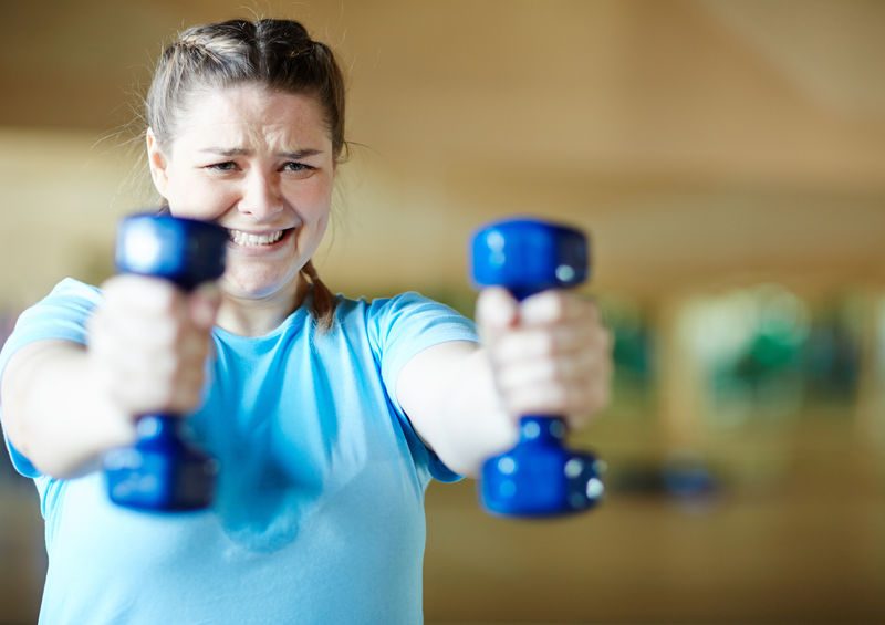 Stepping Off the Scale for Weight Loss Success 2 woman with weights