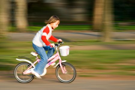 biking fast in the park