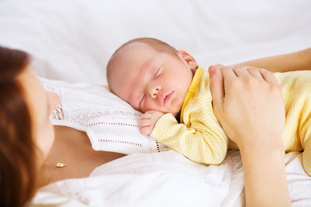 infant on mothers chest