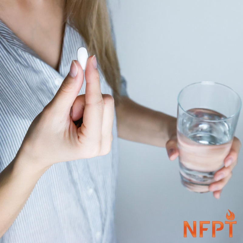 Medication and Exercise: Interactions and Implications 2 woman taking medicine