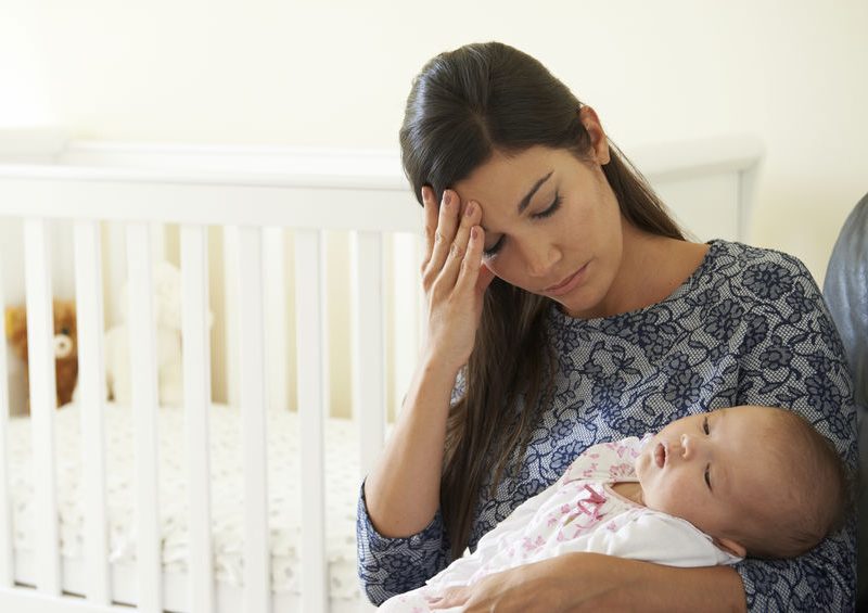 How to Care for and Support the Postpartum Fitness Client 2 Tired Mother Suffering From Post Natal Depression