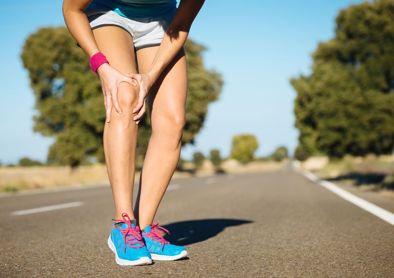 Female Runner Knee Injury And Pain.