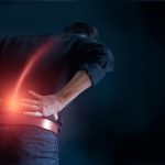 Man Suffering From Back Pain Cause Of Office Syndrome, His Hands
