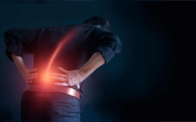 Scope of Practice for the Fitness Professional: Medical Guidance and Advice 2 Man Suffering From Back Pain Cause Of Office Syndrome, His Hands