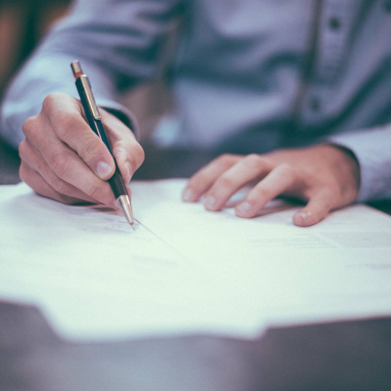 Protect Your Business with Personal Trainer Legal Forms 2 signing paperwork
